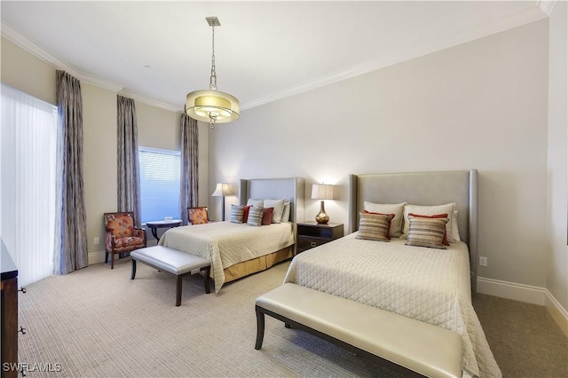 bedroom featuring ornamental molding and carpet floors