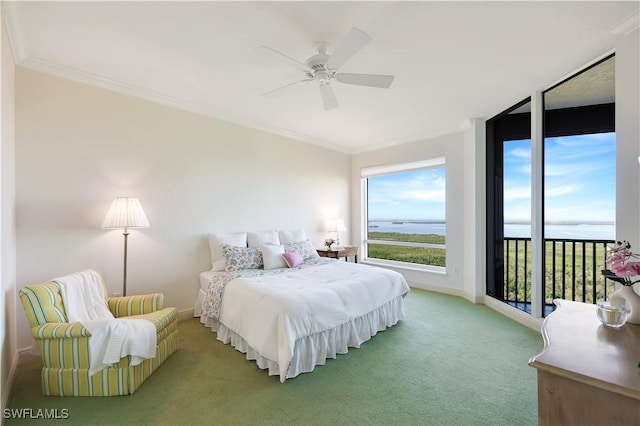 carpeted bedroom with access to exterior, crown molding, ceiling fan, and a water view