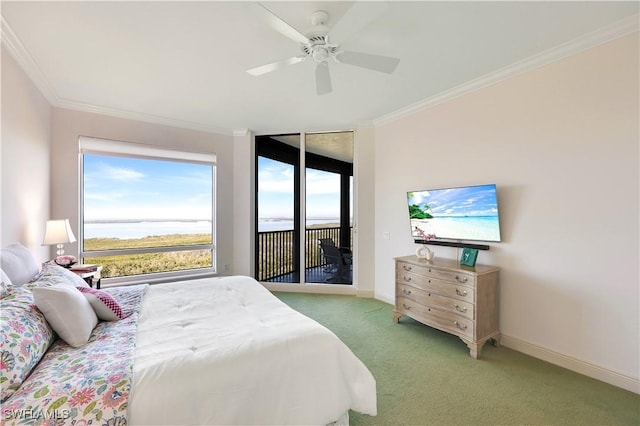 carpeted bedroom featuring ceiling fan, ornamental molding, and access to outside