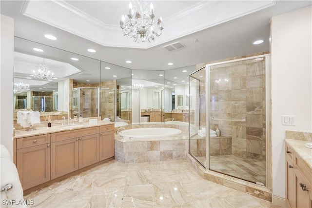 bathroom with an inviting chandelier, a tray ceiling, independent shower and bath, and crown molding