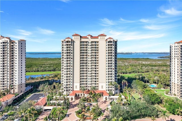 view of building exterior featuring a water view