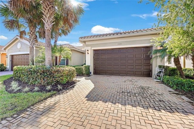 view of front of property featuring a garage