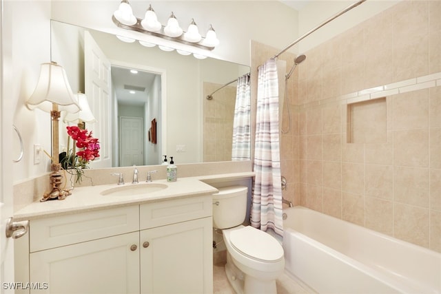 full bathroom featuring vanity, toilet, and shower / bath combo