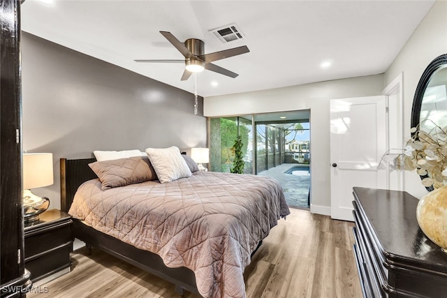 13 Pelican St W, Naples, FL 34113 - bedroom featuring access to outside, light hardwood / wood-style floors, and ceiling fan