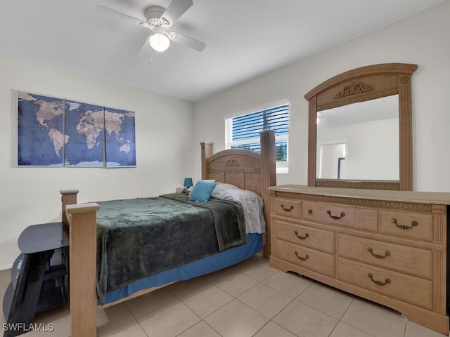 bedroom featuring light tile patterned floors and ceiling fan