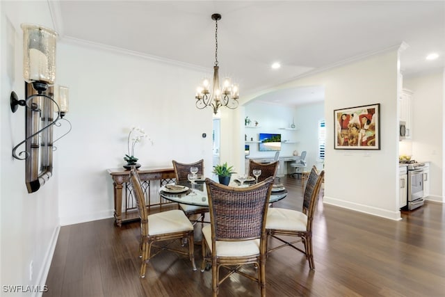 dining space with crown molding, a chandelier, and dark hardwood / wood-style flooring