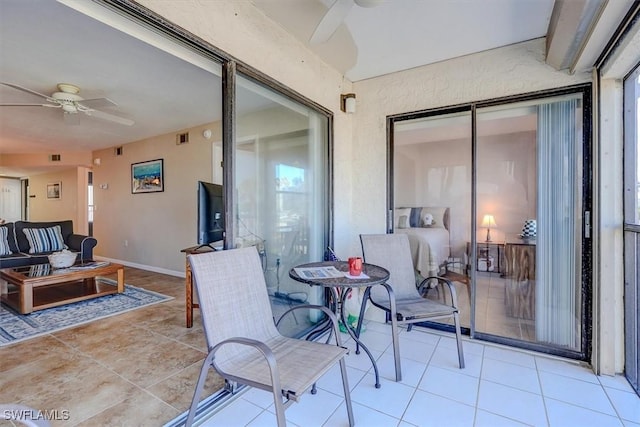 view of patio with an outdoor hangout area and ceiling fan