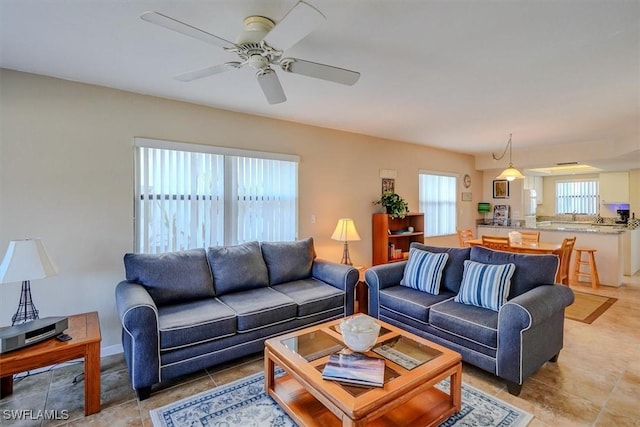 living room with ceiling fan