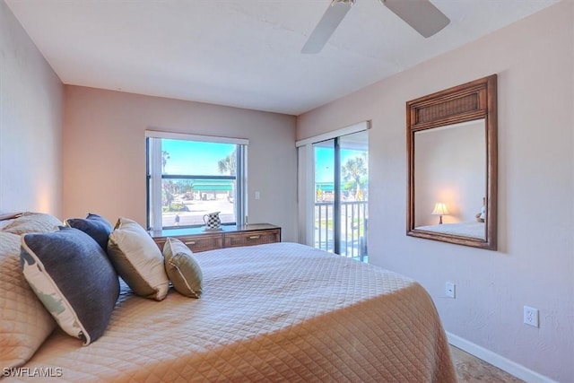 bedroom featuring ceiling fan and access to outside