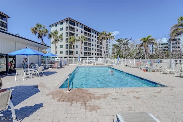 view of pool featuring a patio