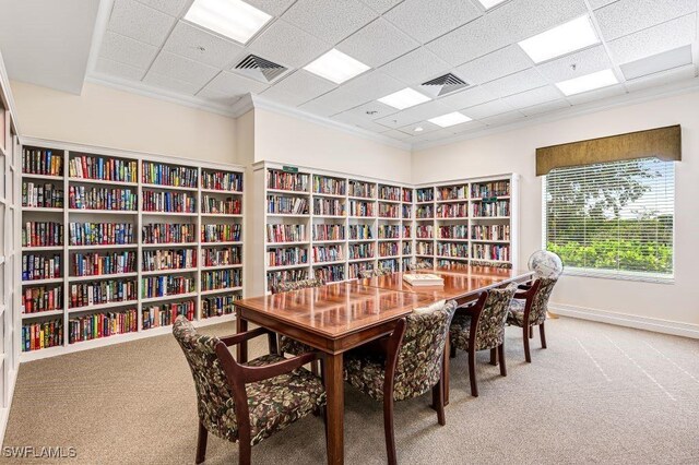 201 Arbor Lake Dr Unit 2-404, Naples, FL 34110 - carpeted dining area featuring a drop ceiling, baseboards, and crown molding