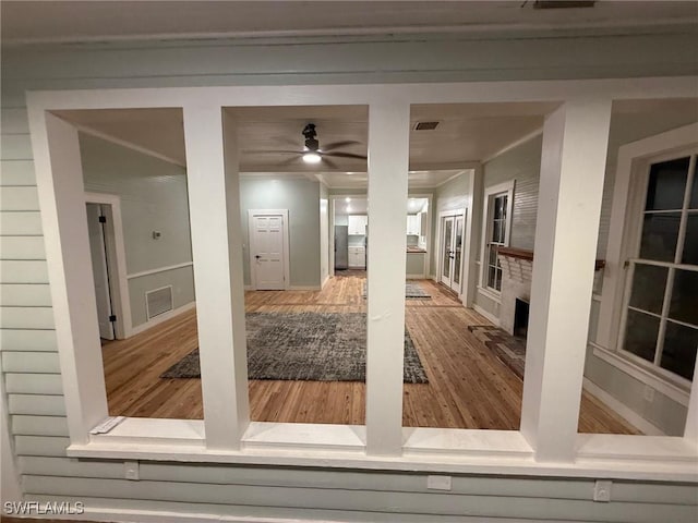 interior space featuring ceiling fan