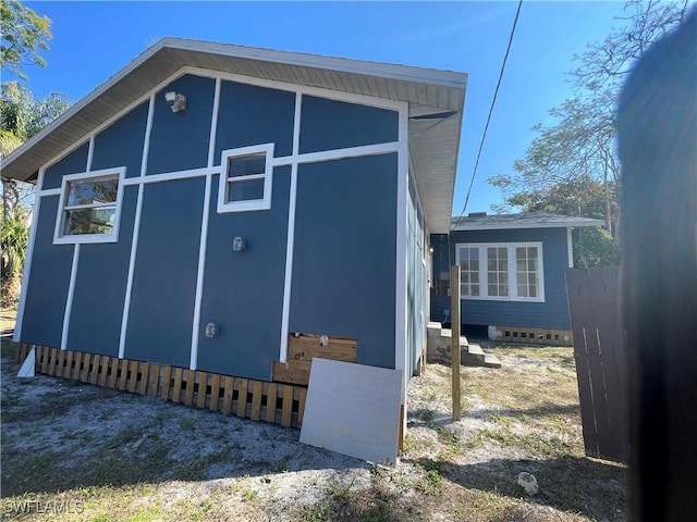 view of property exterior featuring an outdoor structure