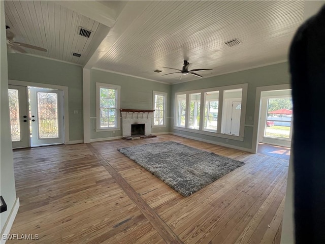 living room with crown molding, hardwood / wood-style flooring, and ceiling fan