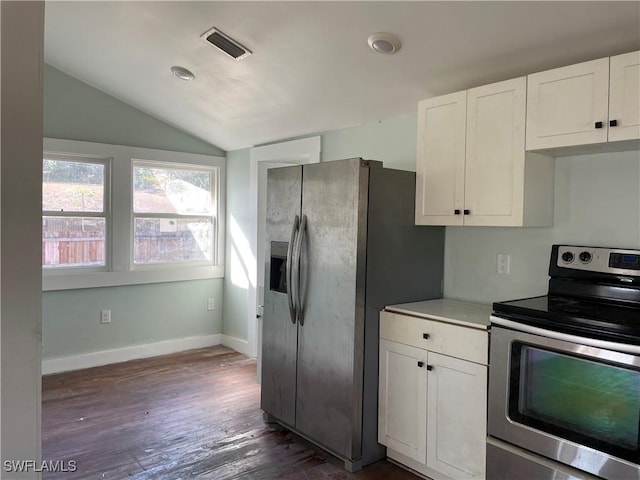 kitchen featuring white cabinetry, dark hardwood / wood-style flooring, stainless steel appliances, and lofted ceiling