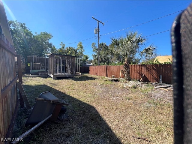 view of yard featuring a wooden deck