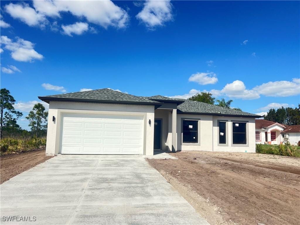 prairie-style home with a garage