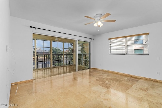 empty room featuring ceiling fan