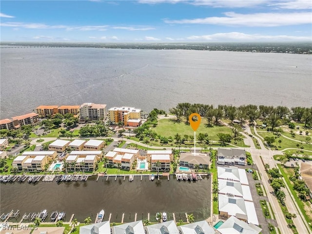 birds eye view of property featuring a water view