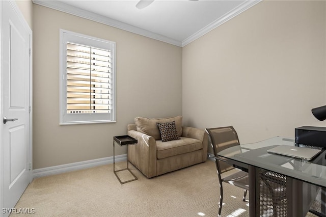 carpeted home office featuring crown molding