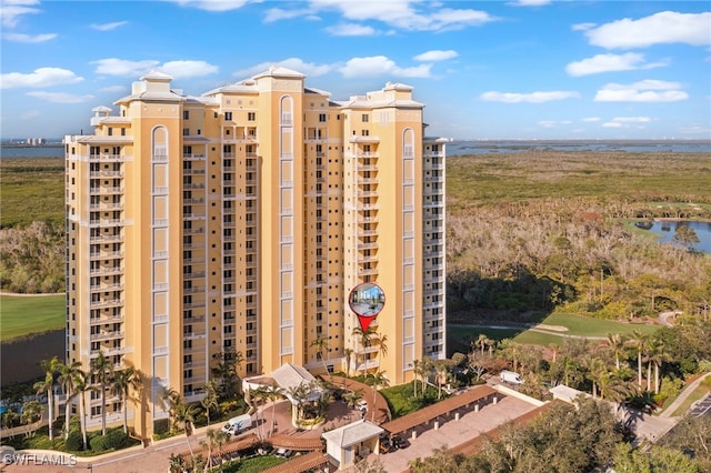 view of building exterior featuring a water view