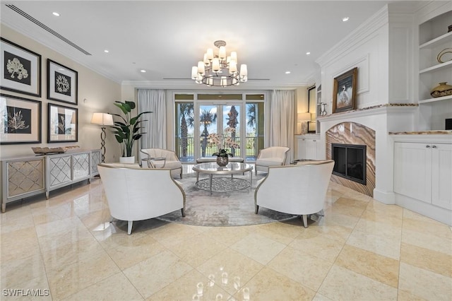 living room featuring a notable chandelier and crown molding