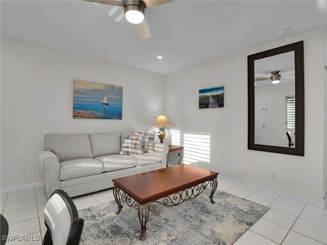 tiled living room featuring ceiling fan