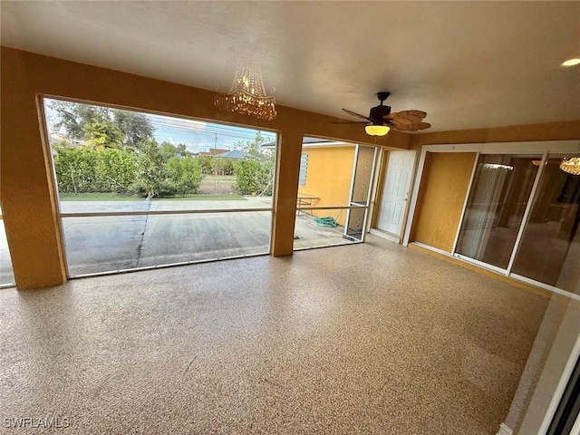 unfurnished room featuring ceiling fan