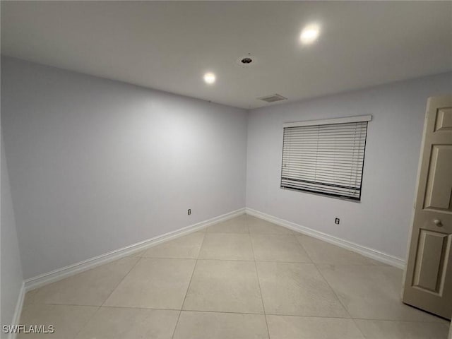 view of tiled spare room