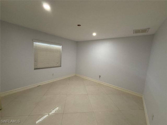 view of tiled spare room