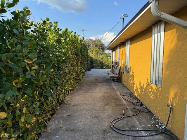 view of property exterior featuring a patio