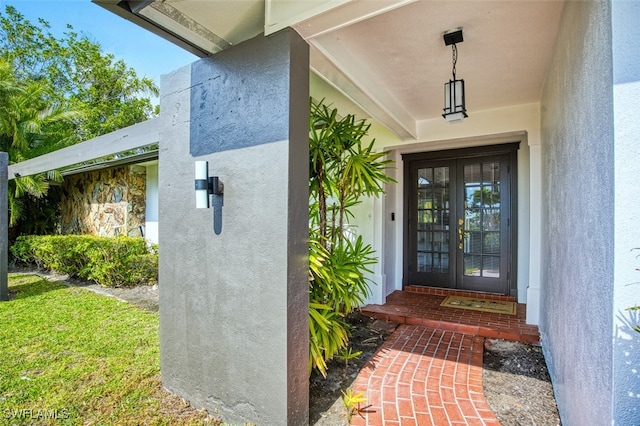 doorway to property featuring french doors