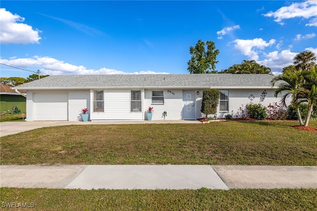 single story home with a garage and a front yard