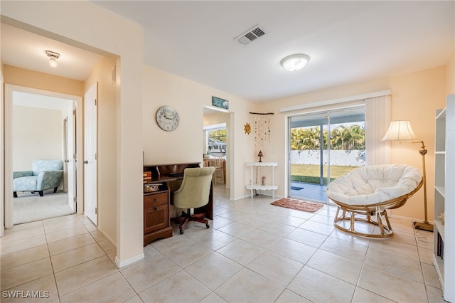 office with light tile patterned flooring