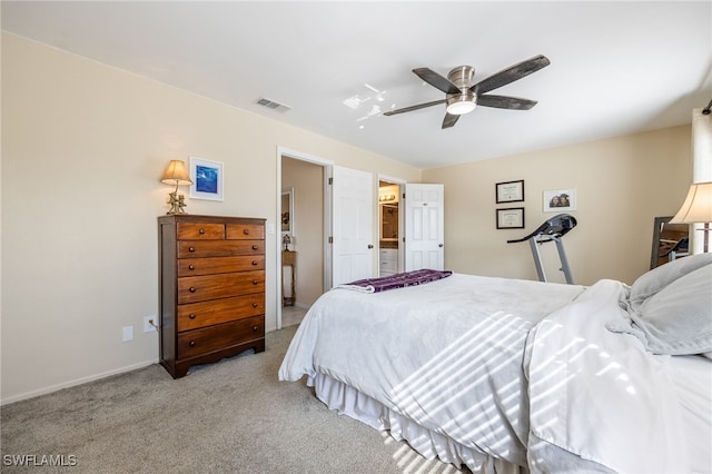 bedroom with ceiling fan and light colored carpet