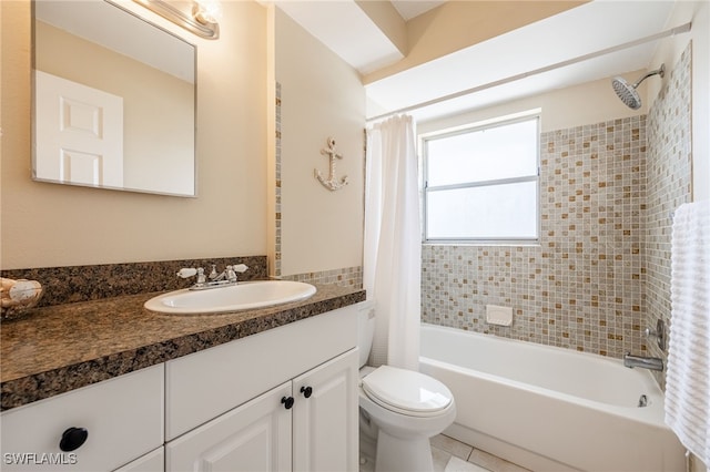 full bathroom with vanity, shower / tub combo with curtain, tile patterned floors, and toilet