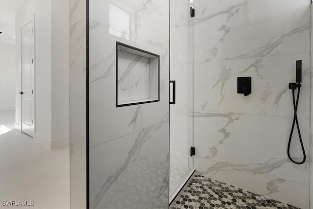 bathroom with an enclosed shower