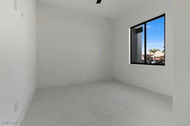 unfurnished room featuring ceiling fan