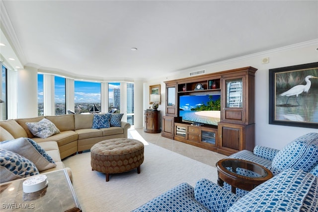 living room featuring light tile patterned floors and crown molding