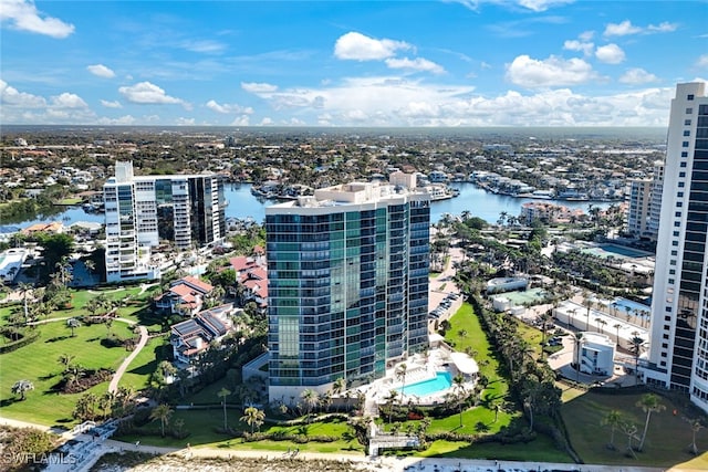 birds eye view of property with a water view