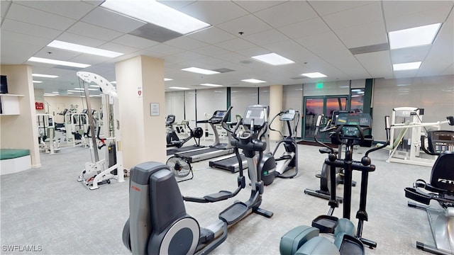 gym featuring a drop ceiling