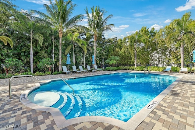 pool featuring a patio area