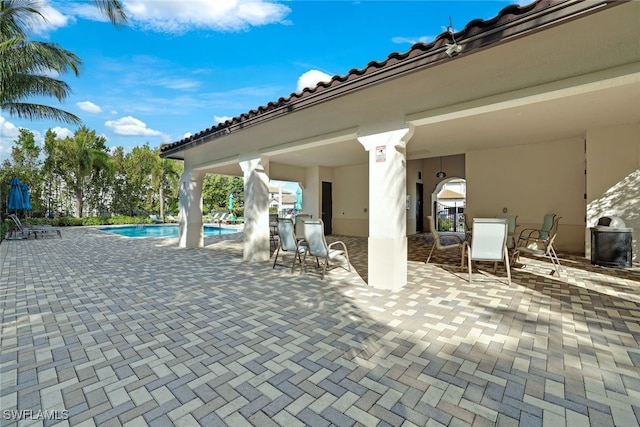 view of patio / terrace featuring a community pool