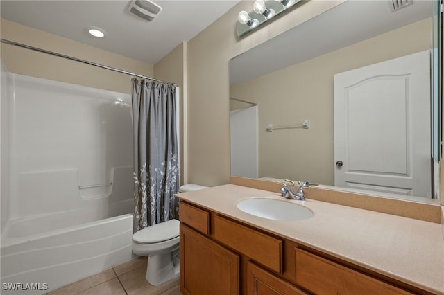 full bathroom with shower / tub combo, vanity, tile patterned floors, and toilet