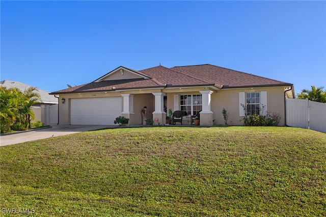 single story home with a garage and a front lawn