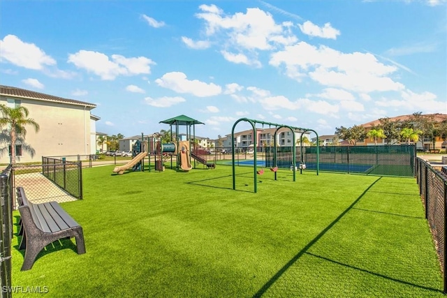 view of jungle gym with a yard