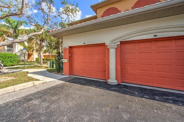 garage with central AC unit