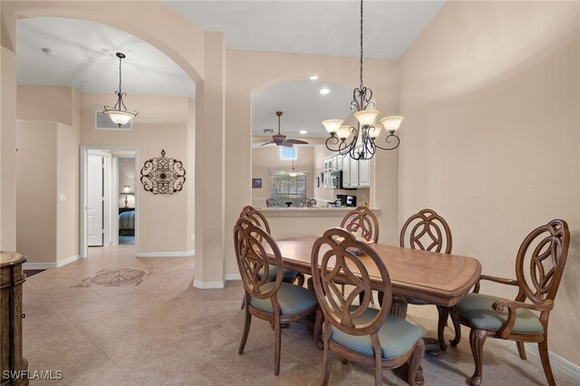 dining room featuring ceiling fan