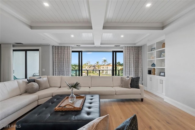 living room featuring crown molding, wood finished floors, built in features, beamed ceiling, and recessed lighting