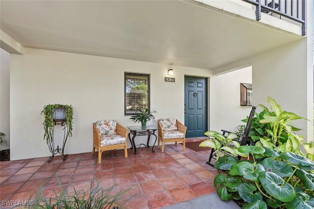 doorway to property featuring a balcony